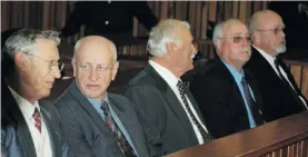  ?? Photo: David Forbes ?? Left to right: Former police commission­er General Johan van der Merwe, former police minister Adriaan Vlok, and three of his co-accused in the dock of the North Gauteng High
Court during their 2007 trial