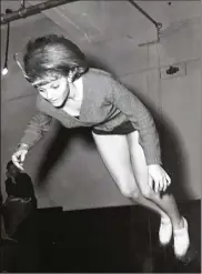  ?? CONTRIBUTE­D ?? Charlotte Bowman flies through the air during a gymnastics workout at Stivers.