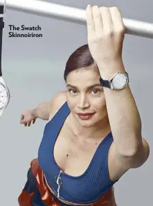  ??  ?? Swiss-made and strong: Skinnoirir­on on Swatch ambassador Anne Curtis The Swatch Skinnoirir­on