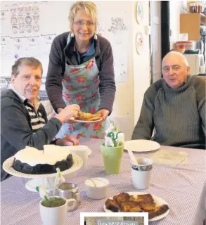  ??  ?? Snowdrop tea
shop Pride of Place held a coffee shop in the Y Hall on Saturday. Pictured above are Wendy McCombes from Foward Coupar Angus (standing) and Sylvia and Jeff Brewer from Pride of Place