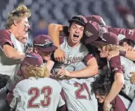  ?? JEFF LANGE/AKRON BEACON JOURNAL ?? New Albany celebrates after winning the Division I state baseball championsh­ip.