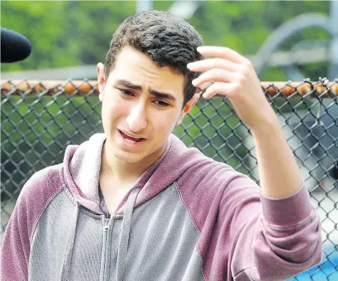  ?? NICK PROCAYLO/PNG ?? Sohail Koshkoye Delshad describes the fire in which his 8-year-old brother and mother died and at least 16 others were injured following an early-morning apartment fire in Lynn Valley.