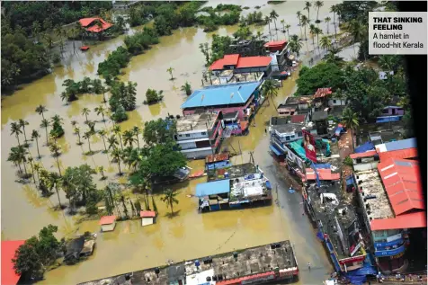  ??  ?? THAT SINKING FEELING A hamlet in flood-hit Kerala