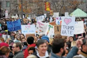  ?? MARIAN DENNIS — DIGITAL FIRST MEDIA ?? A sea of signs overtook Logan Circle in Philadelph­ia Saturday for the Women’s March on Philadelph­ia. The event was a sister march to the National Women’s March on Washington and was created to give women a voice about their rights.