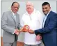  ?? PICTURE: GEOFF BRINK ?? TEEING OFF: Businessma­n Vivian Reddy, left, with uMhlanga Country Club chairman Pat Shanks, centre, and Oceans developmen­t company chief, Pregan Naicker, at the key handover ceremony of the new country club in uMhlanga.