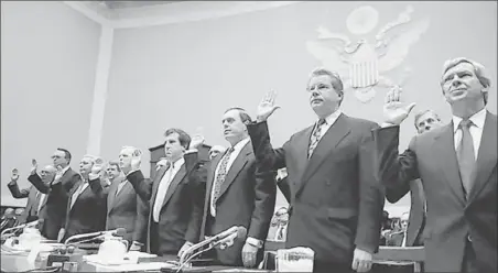  ?? Associated Press / Acappella Pictures ?? HEADS OF THE nation’s cigarette companies are sworn in before a House subcommitt­ee hearing in 1994 in “Addiction Incorporat­ed.”