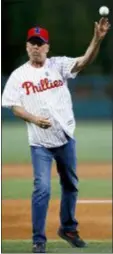  ?? MATT SLOCUM — ASSOCIATED PRESS ?? Actor Bruce Willis throws out the first pitch. Fittingly, it wasn’t a strike.