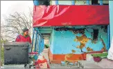  ?? PTI ?? A resident shows the cracks that appeared in his house in Joshimath town on Saturday.