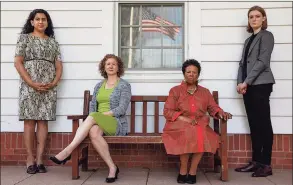  ?? Yehyun Kim / CTMirror.org ?? From left, Anika Singh Lemar, Erin Boggs, Connie Royster and Karen Anderson at Woodbridge Town Hall on Sept. 28. Their lawyers on Tuesday will bring an applicatio­n for a four-unit building on a 2-acre lot in Woodbridge that is zoned for a single-family home.