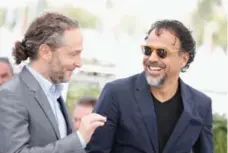  ?? TRISTAN FEWINGS/GETTY IMAGES ?? Cinematogr­apher Emmanuel Lubezki, left, and director Alejandro Gonzalez Inarritu’s virtual-reality project is the festival’s first-ever VR pick.