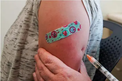  ?? ?? A nurse administer­s a measles vaccine in Provo, Utah, in 2019. Photograph: George Frey/Getty Images