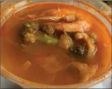  ?? (Arkansas Democrat-Gazette/Eric E. Harrison) ?? We found fish, shrimp, crab, more fish, calamari and mussels in our Sietes Mares (Seven Seas) soup from Taqueria Karina on West 65th Street in Little Rock