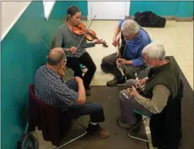  ?? CHAD FELTON — THE NEWS-HERALD FILE ?? The fourth annual Lake Erie Folk Fest runs Feb. 22 through Feb. 23 and features nearly 50 free daytime events, including instructio­nal workshops and jam sessions. The event is held at the Shore Cultural Centre at 291 E. 222nd St. in Euclid.