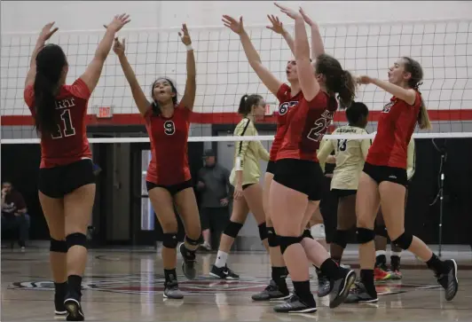  ?? Haley Sawyer/The Signal ?? The Hart girls volleyball team celebrates after a block against Citrus Valley in the second round of the CIF-Southern Section Division 3 tournament on Saturday.