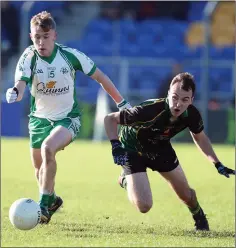  ??  ?? Chris Heaslip races with Hollywood’s Shane Kelly.