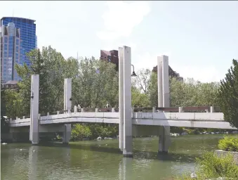  ?? JIM WELLS ?? The Jaipur Bridge in downtown Calgary, which links Eau Claire to Prince’s Island Park, has a current span that opened in 1968 and was designed to endure 50 years.