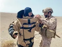  ?? Reuters ?? A member of the UAE Armed Forces is getting ready before searching for landmines in Al Mokha. —