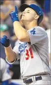  ?? Doug Pensinger Getty Images ?? JOC PEDERSON makes his one hit of the night count for a three-run homer in the sixth.