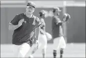  ?? MATT YORK — THE ASSOCIATED PRESS, FILE ?? The A’s Matt Chapman runs during a spring practice on Feb. 22 in Mesa, Ariz.