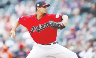  ?? JOE ROBBINS/GETTY IMAGES ?? Carlos Carrasco, who returned to pitch for the Indians this season after undergoing chemothera­py treatments in his battle with leukemia, says he hopes to continue giving back to others.