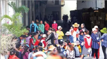  ?? PHA LINA ?? Garment workers striking at the W&amp;D Factory this week. Prime Minister Hun Sen has called for labour unions to stop encouragin­g protests calling for ‘illegal’ demands from employers.