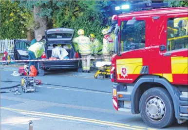  ?? Picture: Andy Clark ?? Emergency services treating an injured person in the MG