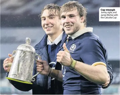  ??  ?? Cup triumph Jonny, right, and Jamie Ritchie with the Calcutta Cup