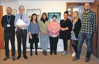  ?? 01_B08trust01 ?? Left to right: Simon Kutesko and Neil Wilkinson (Trust Housing), Helen Ross and Sarah North (Eco Savvy), Angela Glendinnin­g (Trust Housing), Carol Norton and Ellie Bonner (ACVS) and Simon Ross-Gill (Pioneer Project) after they received their £500 cheques at McKelvie Road.