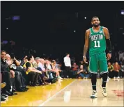  ?? HARRY HOW — GETTY IMAGES ?? Skilled Celtics guard Kyrie Irving is held in very high regard by Warriors coach Steve Kerr: “(He’s) one of the best players in the league.”