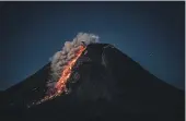  ?? GETTY IMAGES ?? An eruption by Mt Marapi, pictured here during an eruption in 202,1 has killed a group of hikers and left others missing.