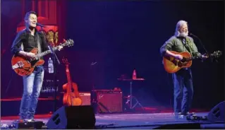  ?? JOHN RENNISON, THE HAMILTON SPECTATOR ?? Blue Rodeo’s Jim Cuddy, left, and Greg Keelor played the first of two sold-out shows Friday night at Hamilton Place.