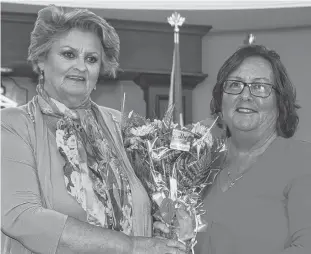  ?? BRAE SHEA/JOURNAL PIONEER ?? Deputy Mayor Norma McColeman joins Barbara McNeill at the ceremony marking McNeill’s 30th anniversar­y of swimming the English Channel.