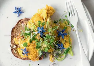  ??  ?? Egg, walnut and watercress sandwiches.