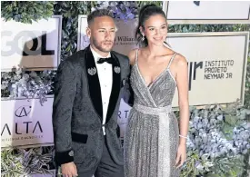  ??  ?? Neymar and his girlfriend Bruna Marquezine at an auction to raise funds.