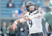  ?? GERALD HERBERT — THE ASSOCIATED PRESS ?? Quarterbac­k Desmond Ridder has passed for 3,190 yards and 30 touchdowns to lead Cincinnati to a 13-0 record and into the CFP semifinals against No. 1 Alabama.