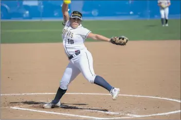  ??  ?? College of the Canyons sophomore pitcher Joy Veloz picked up her second win of the season after striking out nine Antelope Valley College batters to help lead the Cougars to a big 7-2 conference victory.