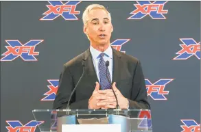  ?? Chris Urso / TNS ?? XFL Commission­er and CEO Oliver Luck speaks during a news conference in March at Raymond James Stadium in Tampa, Fla. Luck, along with others, spoke during the announceme­nt that Marc Trestman was named head coach of the Tampa Bay XFL team.