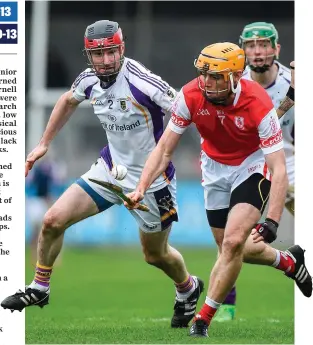  ?? MATT BROWNE/SPORTSFILE ?? Cuala’s Paul Schutte in action against Niall Corcoran of Kilmacud Crokes. Below: Schutte lifts the trophy at Parnell Park