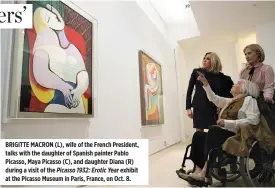  ??  ?? BRIGITTE MACRON (L), wife of the French President, talks with the daughter of Spanish painter Pablo Picasso, Maya Picasso (C), and daughter Diana (R) during a visit of the Picasso 1932: Erotic Year exhibit at the Picasso Museum in Paris, France, on...