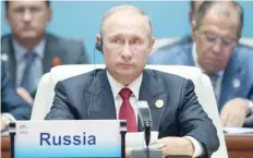  ?? — AFP ?? Russian President Vladimir Putin attends the BRICS Summit on Tuesday.