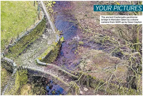  ??  ?? The ancient Eastergate packhorse bridge in Marsden taken by a drone camera from 165ft up by Dave Clayton