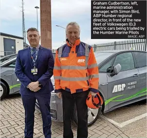  ?? IMAGE: ABP ?? Graham Cudbertson, left, marine administra­tion manager, with Simon Bird, ABP Humber regional director, in front of the new fleet of Volkswagen ID.3 electric cars being trialled by the Humber Marine Pilots