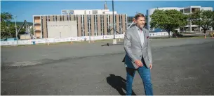  ?? COURANT FILE PHOTO ?? Bristol Mayor Jeff Caggiano walks across the site of the Wheeler Health Facility. He told the Courant that he is hopeful that the renovation­s and constructi­on in the city will attract more people to visit.