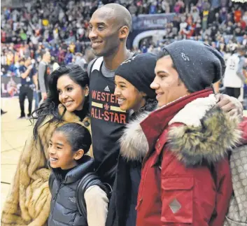  ?? BOB DONNAN, USA TODAY SPORTS ?? Kobe Bryant, center, making his 18th and final appearance as an NBA All- Star, was all smiles during the weekend festivitie­s in Toronto.