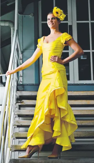  ??  ?? Tiah Portelli models Kevin de Beer’s (pictured top right) stunning daffodil dress Pictures: MICHAEL FRANCHI