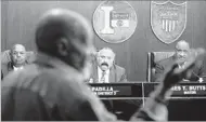  ?? Luis Sinco Los Angeles Times ?? INGLEWOOD CITY COUNCILMEN, including Mayor James T. Butts Jr., right, listen to residents at meeting.