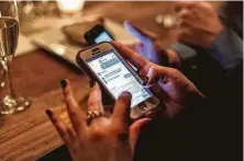  ?? Richard Perry / New York Times ?? Careful out there: Americans lost millions in online “romance scams” last year, according to the Federal Trade Commission. Many victims 70 and older were the hardest hit.