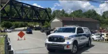  ?? KDKA-TV ?? Police block off a road around train tracks where a 15-yearold girl was killed after being struck by a train Wednesday.