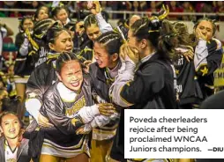  ?? —DIU ?? Poveda cheerleade­rs rejoice after being proclaimed WNCAA Juniors champions.