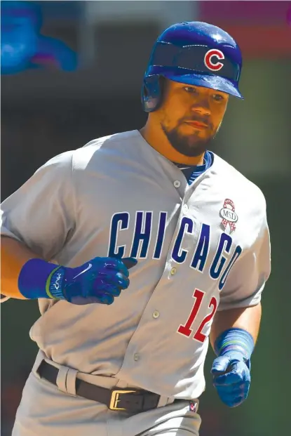  ?? GETTY IMAGES ?? The Cubs’ Kyle Schwarber rounds the bases Thursday after hitting a home run in the seventh inning on Opening Day.